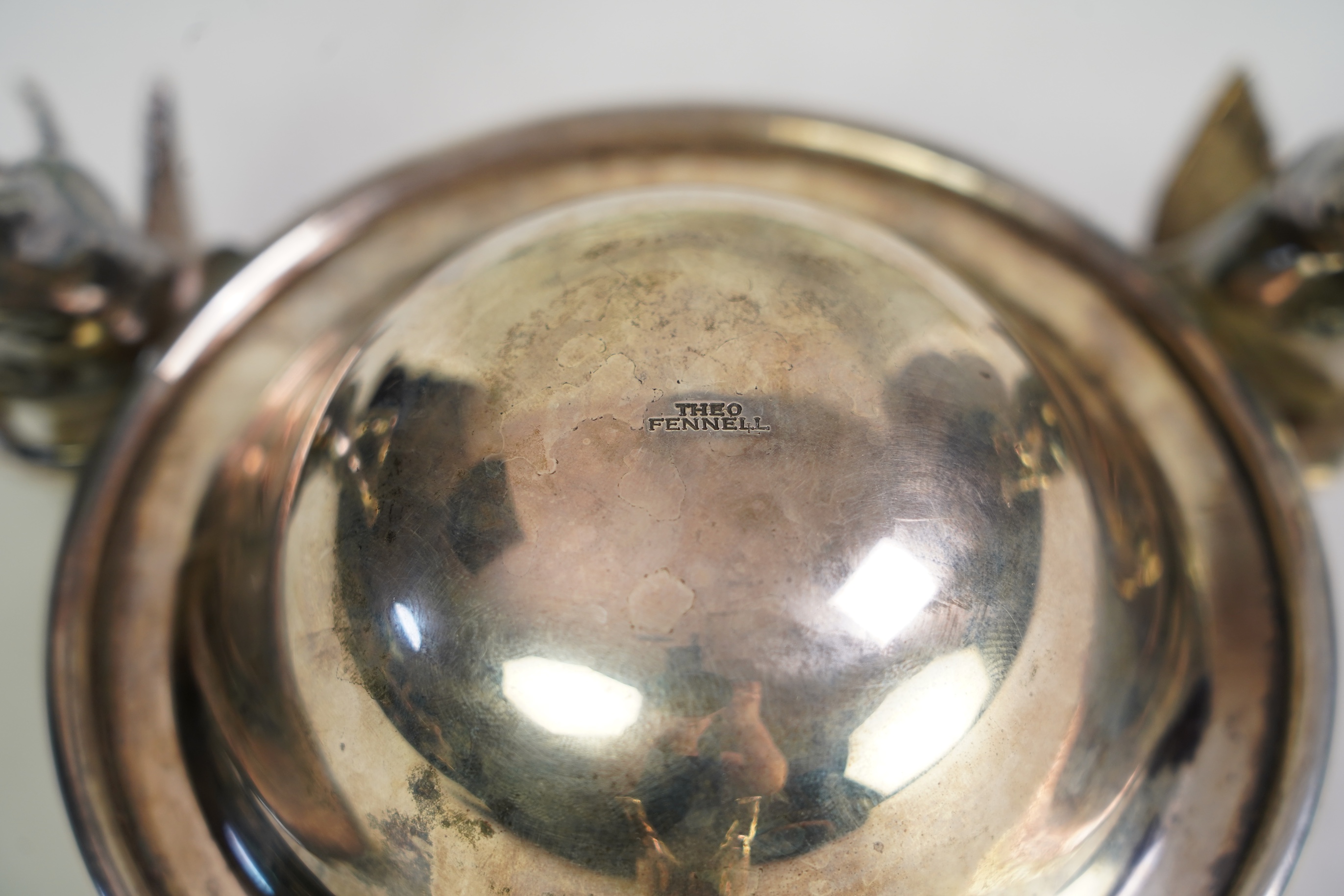An Elizabeth II Theo Fennell silver bonbon bowl, with three cherub supports